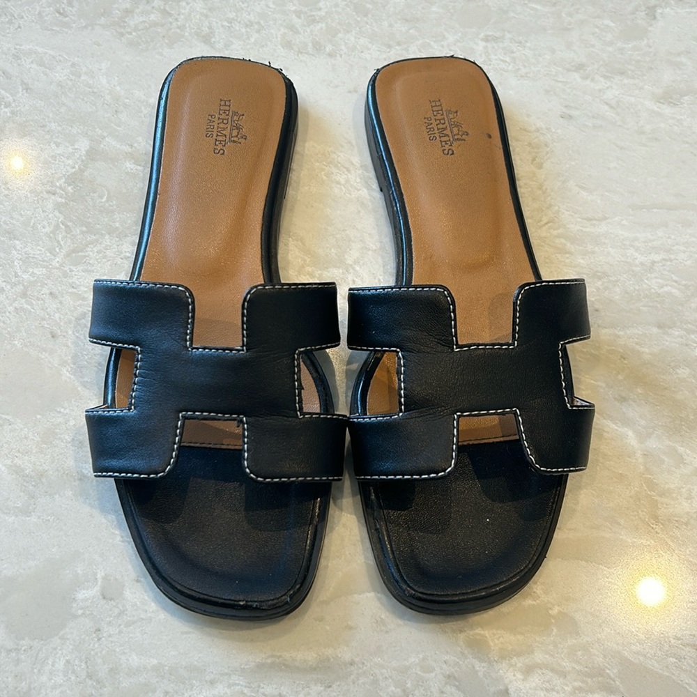 Hermes’ Oran sandals black size 37